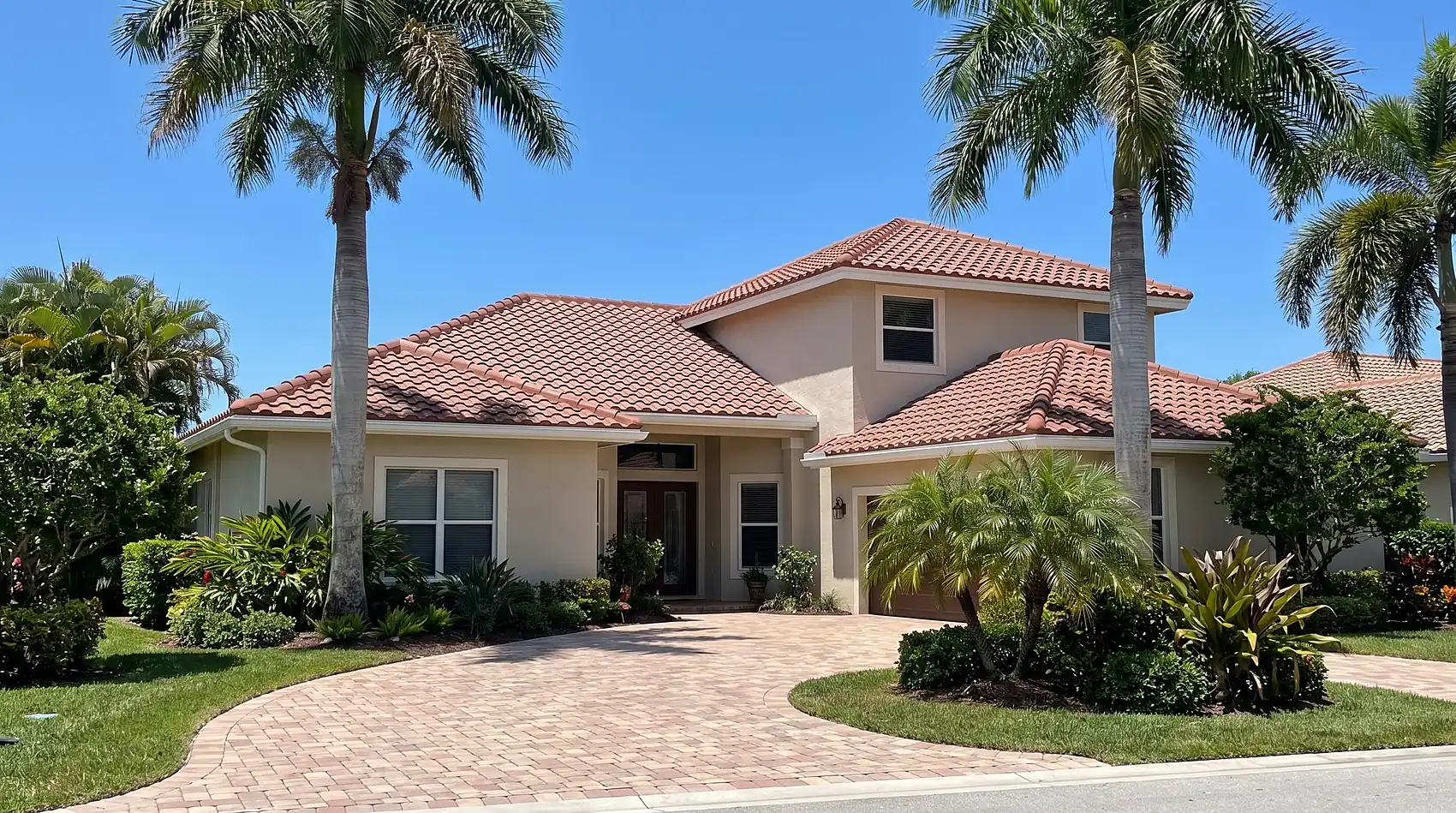 Completed barrel tile roof on a two-story South Florida home