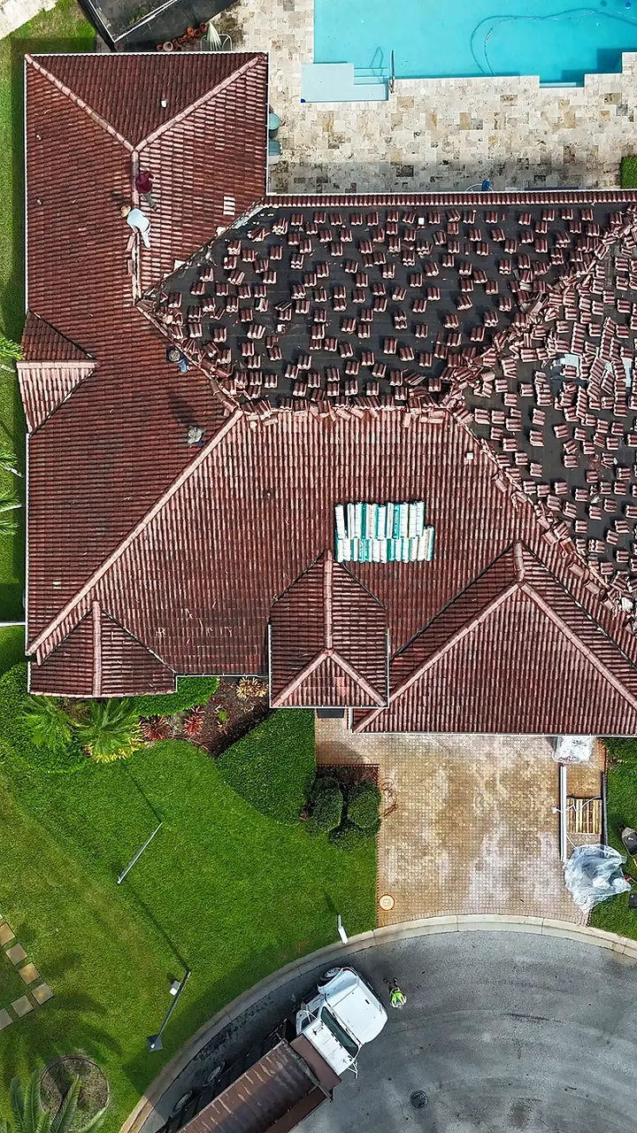 Roof tear-off in progress, from above